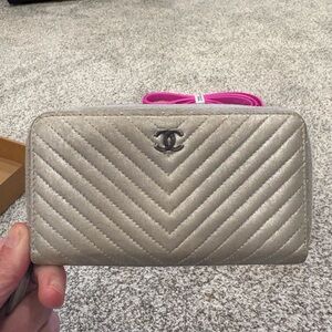 Chanel Silver Quilted zippy wallet
